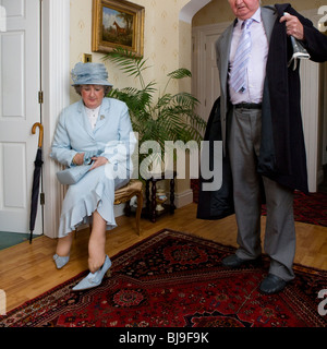 senior could preparing to go out to the horse track Stock Photo