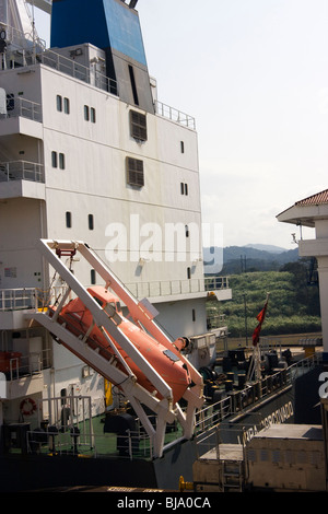 Escape pod or free-fall lifeboat on the back of a container ship Stock Photo