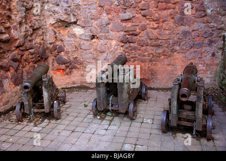 Bronze Canons at the ancient stone walls Exeter City Devon England UK Stock Photo