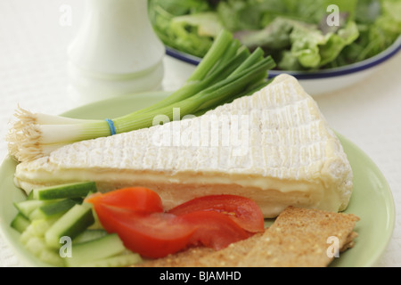 Brie Cheese with Salad and Multi Grain Crackers Stock Photo