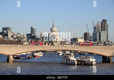 View looking east along the River Thames London, towards St Paul's Cathedral from Hungerford Bridge, Charing Cross, London, UK. Stock Photo