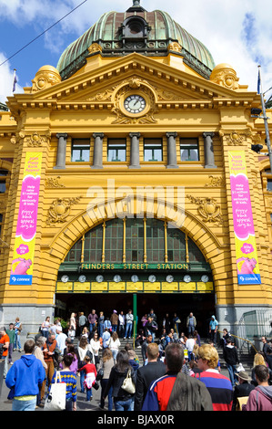 An icon of Melbourne: the entrance to Flinders Street Station. The station entrance is known locally as 'under the clocks'. Stock Photo