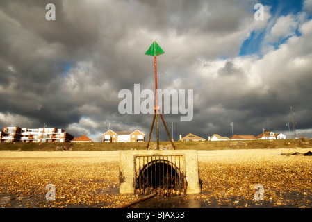 outfall water pipe on a beach Stock Photo