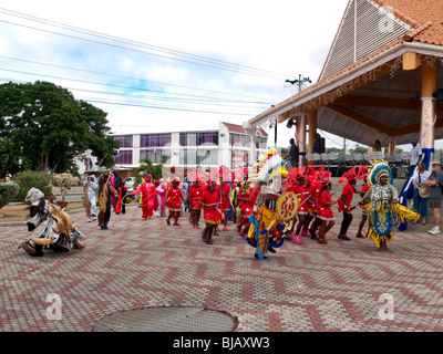 Tobago Kiddies Carnival parade of the Fancy  Indians mas with the children in the Red Indian costume Stock Photo