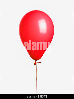 red balloon with ribbon cut -out on white background Stock Photo