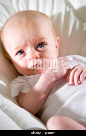 Close-up of newborn baby with blue eyes Stock Photo