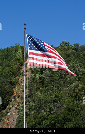 Tourists on a Lift Crockett a Center city Gatlinburg Tennessee TN  forest in USA  flag U.S.on stand pole North America US everyday daily life hi-res Stock Photo