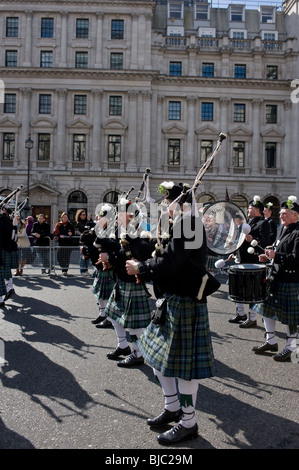 Pipers of the St Nauls Pipe Band marching during the St Patrick's Day celebrations in London. Stock Photo