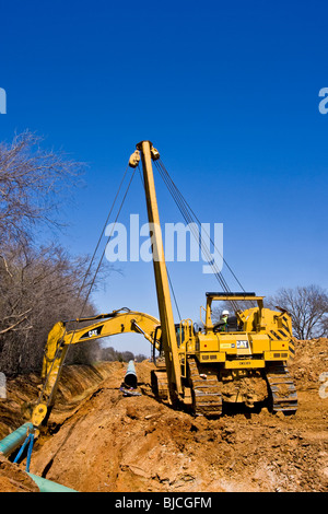 Construction equipment and skilled personnel are required for pipeline construction in northern Texas, U.S.A. Stock Photo