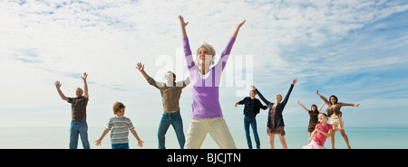 Group of people jumping with joy Stock Photo
