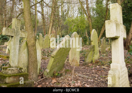 Highgate Cemetery , London , random headstones & graves in disrepair Stock Photo