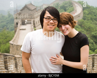 Young couple at the Great Wall of China. Stock Photo