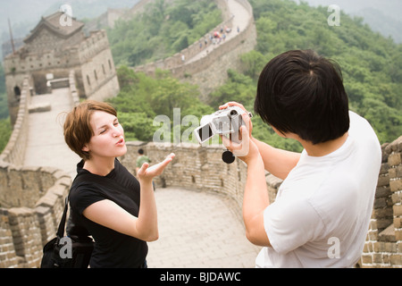 Young couple at the Great Wall of China. Stock Photo