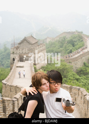 Young couple at the Great Wall of China. Stock Photo