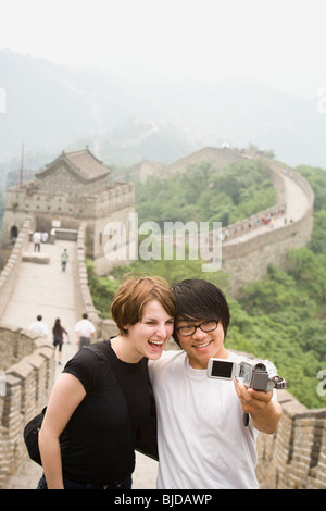 Young couple at the Great Wall of China. Stock Photo