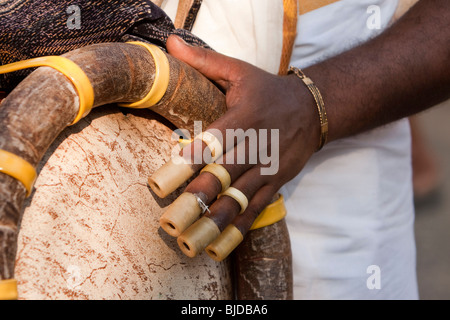 India, Kerala, Kochi, Ernakulam Uthsavom festival, hand and fingers of Madallam drummer Stock Photo