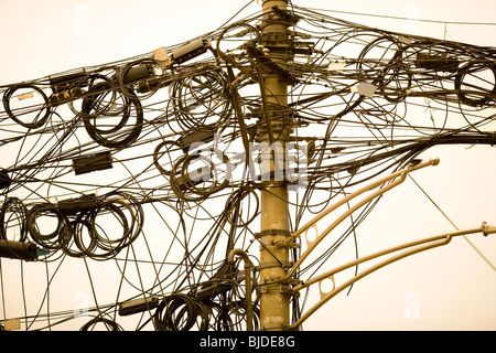 A tangle of cables and wires in Shanghai, China, Asia Stock Photo