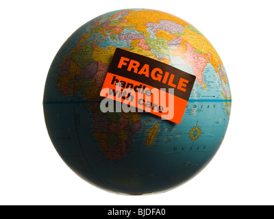 Globe with fragile sticker on it. Stock Photo