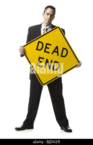 person holding a dead end sign Stock Photo