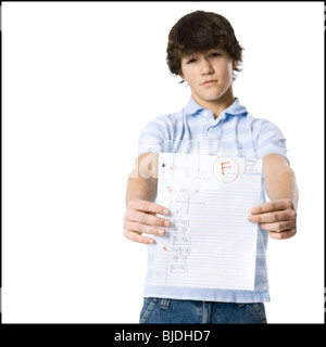 young man showing the grade he received Stock Photo
