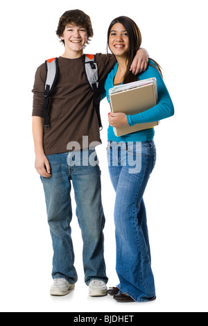 Students with book bags posing Stock Photo