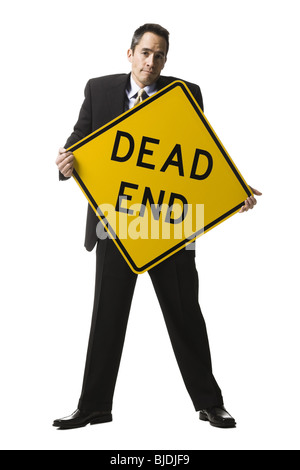 person holding a dead end sign Stock Photo