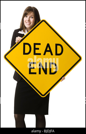 person holding a dead end sign Stock Photo