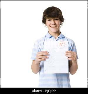 young man showing the grade he received Stock Photo