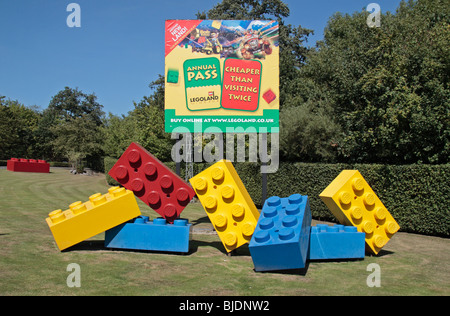A stack of giant red, yellow & blue Lego blocks outside Legoland, Windsor, UK. Stock Photo