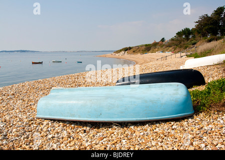 Boats on the beach at Ringstead Bay, Dorset England UK Stock Photo