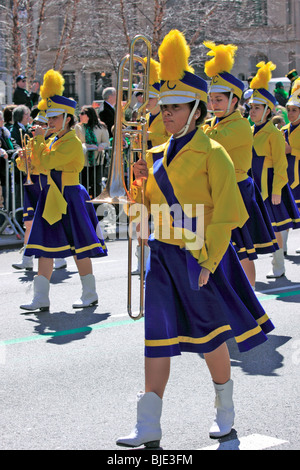 All girl marching band marches up 5th Ave. at the New York City St. Patrick's Day parade Stock Photo