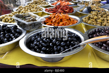 Bowls of olives on display at Farmers Market in Brighton UK Stock Photo