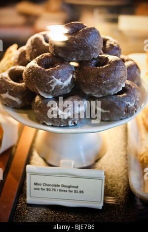 Mini chocolate doughnuts from Starbucks, Canada Stock Photo