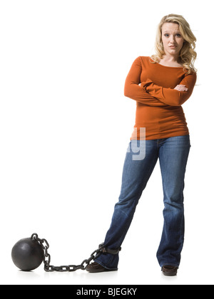 woman with a ball and chain Stock Photo