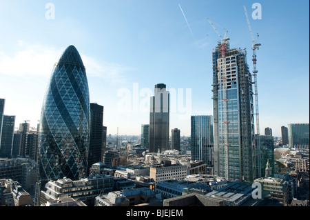 The City of London with views of the Gherkin and Nat West Tower and new construction work being carried out Stock Photo