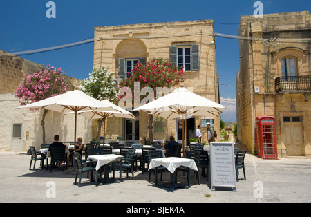 Street cafe and cathedral, San Lawrenz, Gozo, Malta Stock Photo