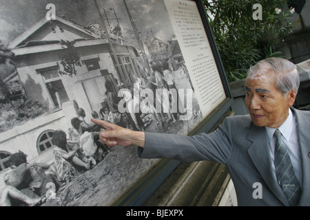 Sunao Tsuboi on Miyuki Bridge, where he was photographed 3 hours after the atomic bombing of Hiroshima. Stock Photo