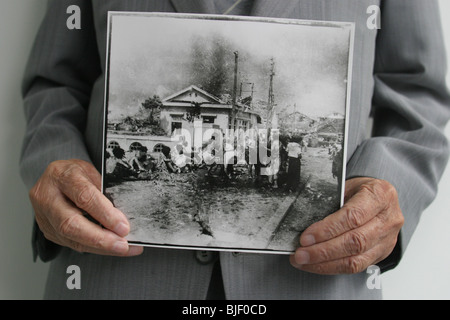 Sunao Tsuboi on Miyuki Bridge, where he was photographed 3 hours after the atomic bombing of Hiroshima. Stock Photo