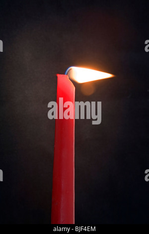 A lighted candle. Stock Photo