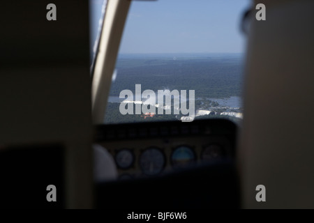 view from a helicopter approaching iguazu falls iguacu national park, parana, brazil, south america Stock Photo