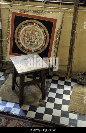 Thangka (Tibetan silk painting with embroidery) in artists' shop in town of Bhaktapur- Kathmandu Valley, Nepal Stock Photo