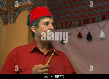 Man smoking a water pipe, Berlin, Germany Stock Photo