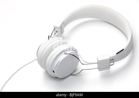 White elegance headfones isolated on white background. White on white series. Stock Photo