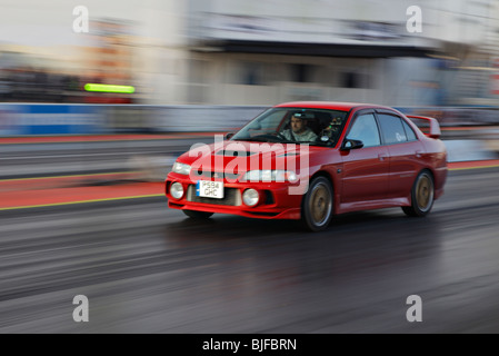 Racing Mitsubishi Evolution at Santa pod. Stock Photo