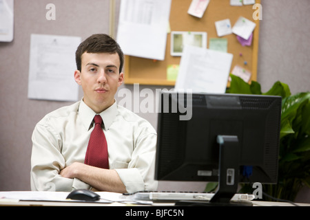 man in a cubicle Stock Photo