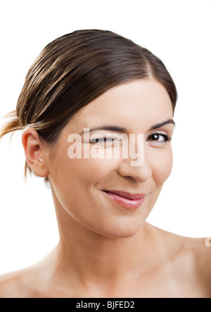 Portrait of a beautiful woman blinking eyes, isolated on white Stock Photo