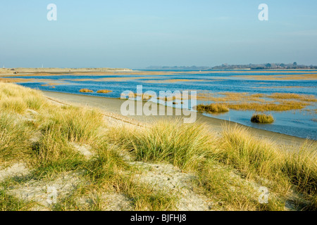 The salt marsh and sand dunes at East Head, West Wittering, near Chichester in West Stock Photo