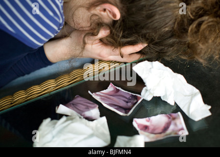 Tearing up photo of ex-boyfriend etc: MODEL RELEASED Stock Photo
