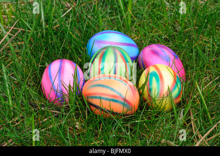 Colorful easter eggs hidden in the grass Stock Photo