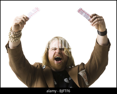 man holding tickets Stock Photo